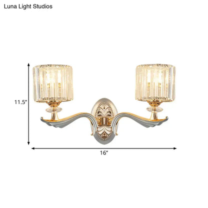 Modern gold wall light with clear crystal shade – living room sconce