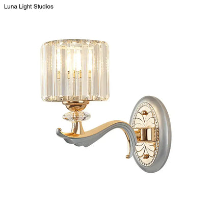 Modern gold wall light with clear crystal shade – living room sconce