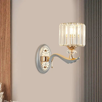 Modern gold wall light with clear crystal shade – living room sconce
