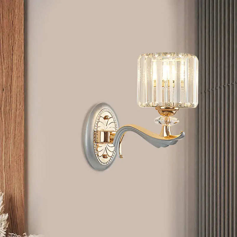 Modern gold wall light with clear crystal shade – living room sconce