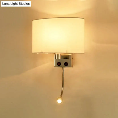 Modern gold wall sconce with fabric shade and bedroom reading light