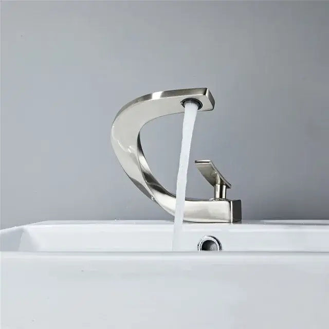 Modern gold & white bathroom basin faucet with curved spout