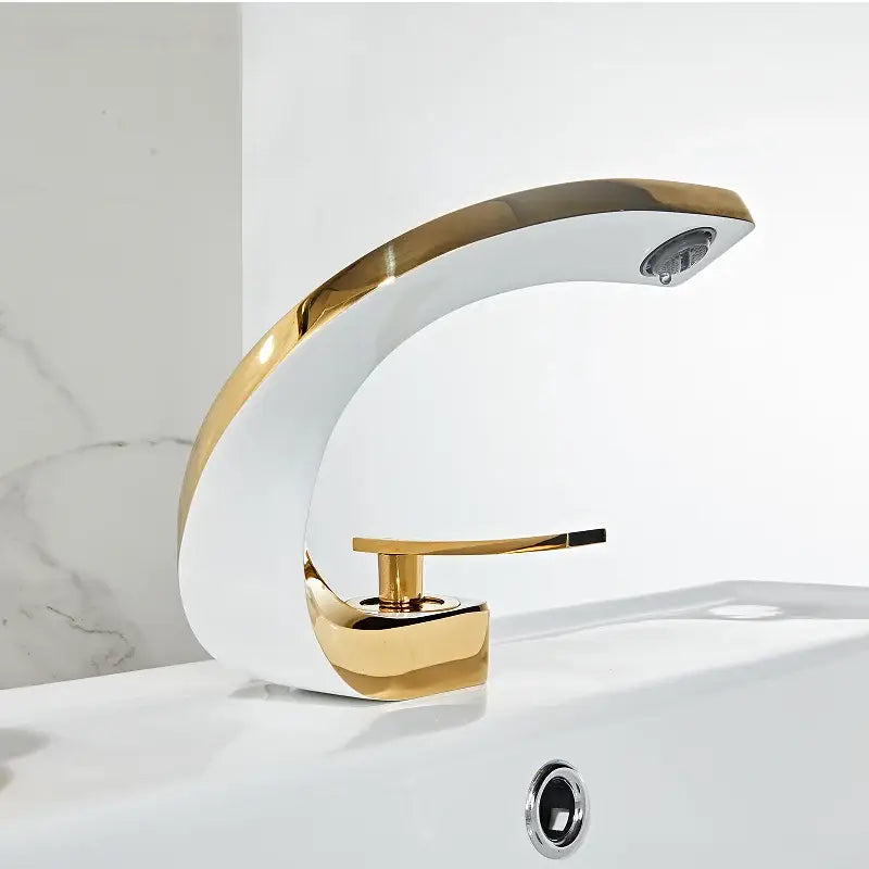 Modern gold & white bathroom basin faucet with curved spout