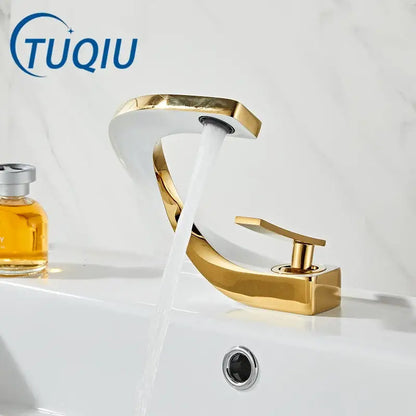 Modern gold & white bathroom basin faucet with curved spout