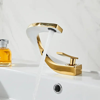 Modern gold & white bathroom basin faucet with curved spout