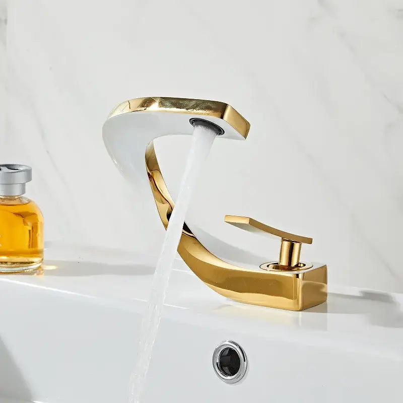 Modern gold & white bathroom basin faucet with curved spout