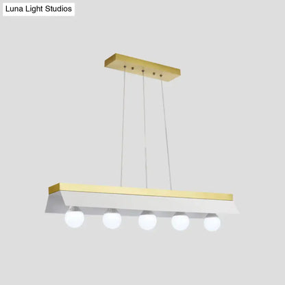 Modern gold & wood pendant light with black & white shade dining room