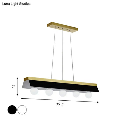 Modern gold & wood pendant light with black & white shade dining room