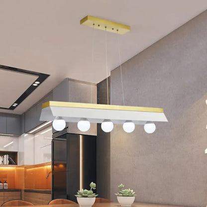 Modern gold & wood pendant light with black & white shade dining room