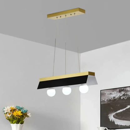 Modern gold & wood pendant light with black & white shade dining room