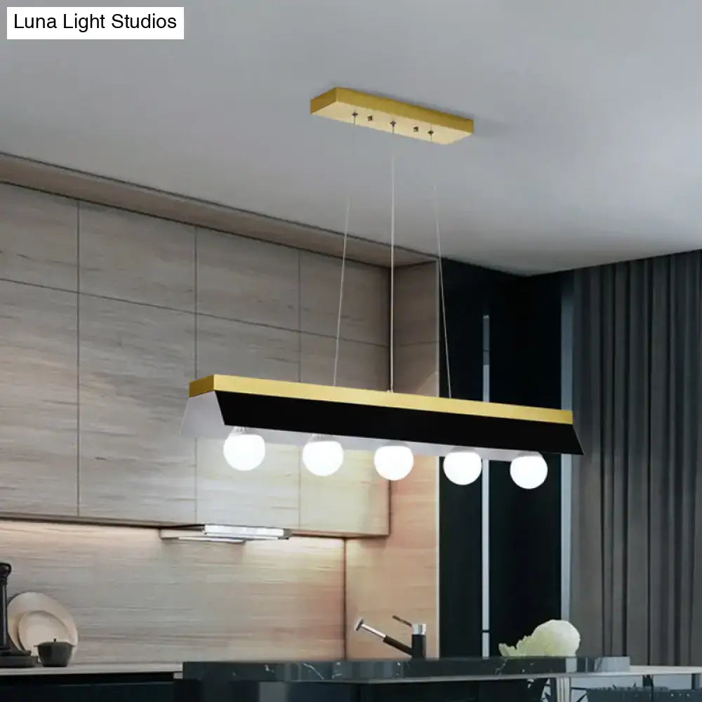 Modern gold & wood pendant light with black & white shade dining room