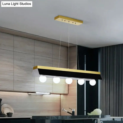 Modern gold & wood pendant light with black & white shade dining room