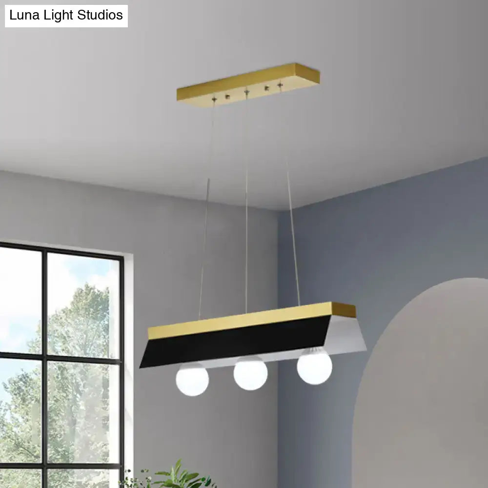 Modern gold & wood pendant light with black & white shade dining room