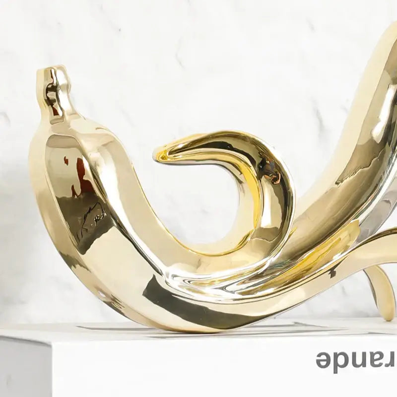 Modern golden banana figurine living room decorative sculpture