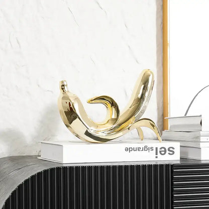 Modern golden banana figurine living room decorative sculpture