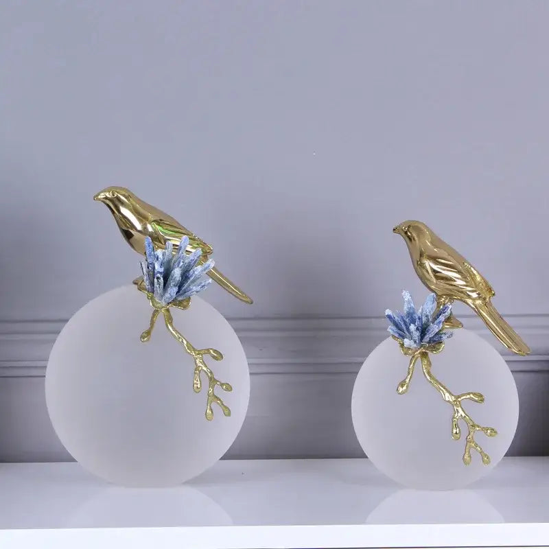 Modern golden bird brass sculpture living room decor with blue crystal