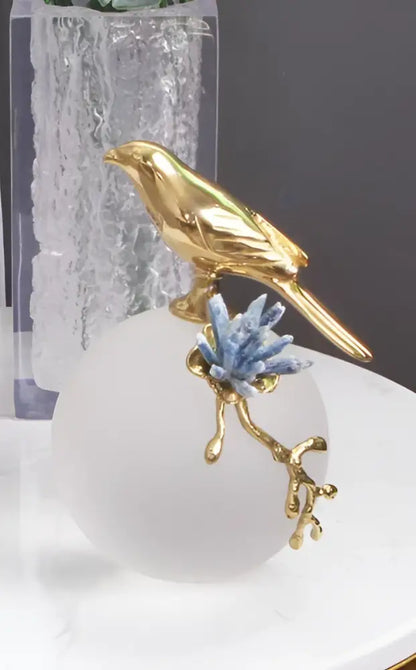 Modern golden bird brass sculpture living room decor with blue crystal