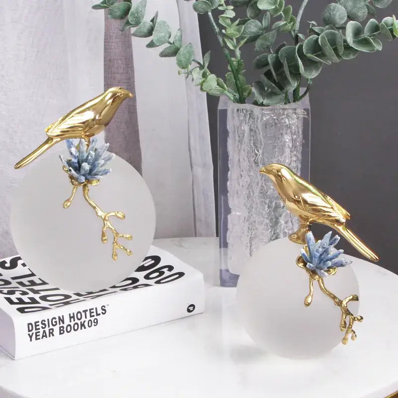 Modern golden bird brass sculpture living room decor with blue crystal