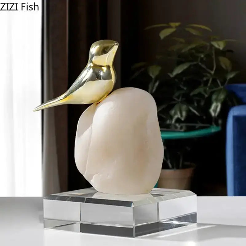Modern golden bird statue with stone base living room ornament