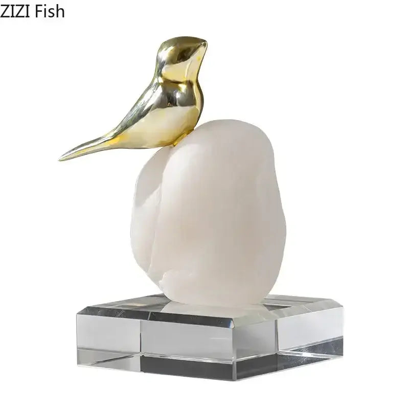 Modern golden bird statue with stone base living room ornament