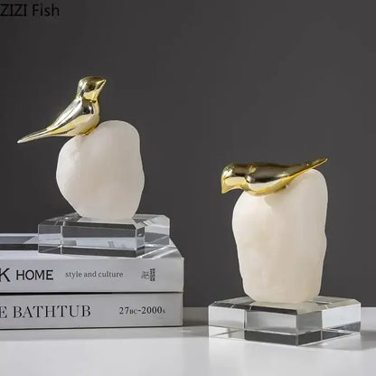 Modern golden bird statue with stone base living room ornament