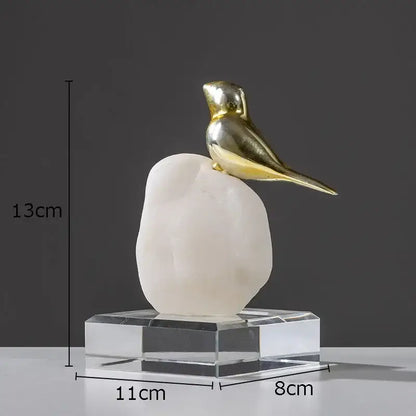Modern golden bird statue with stone base living room ornament