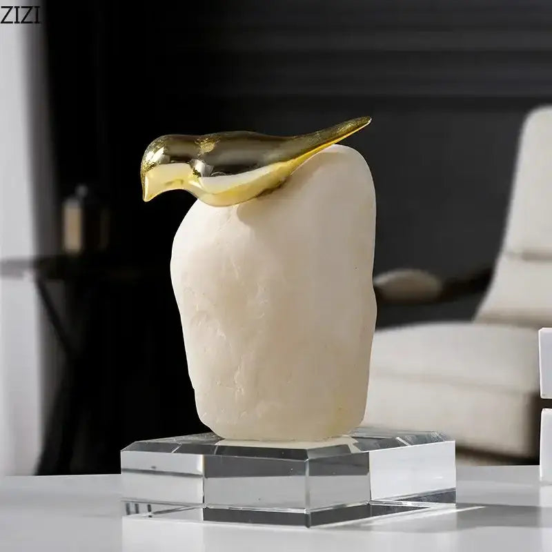 Modern golden bird statue with stone base living room ornament