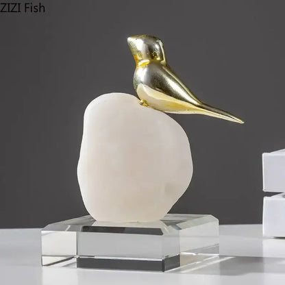 Modern golden bird statue with stone base living room ornament