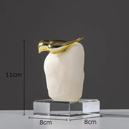 Modern golden bird statue with stone base living room ornament