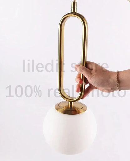 Modern golden glass ball pendant light for kitchen oval metal frame