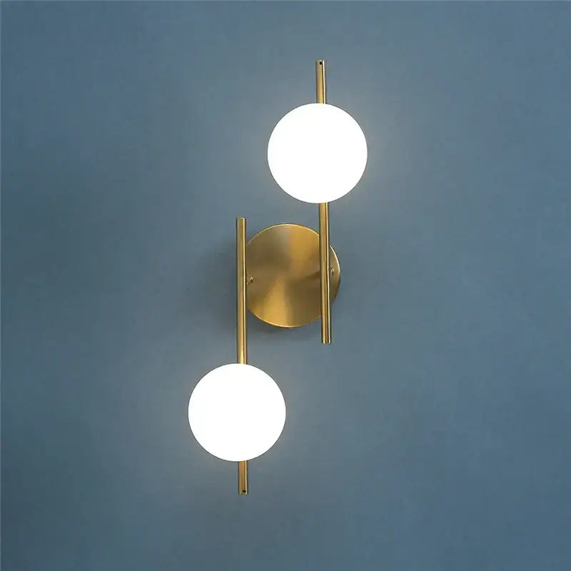 Modern golden led wall lights with milky glass spheres bedroom sconce