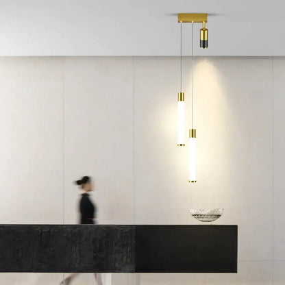 Modern golden pendant chandelier living room sleek cylindrical light