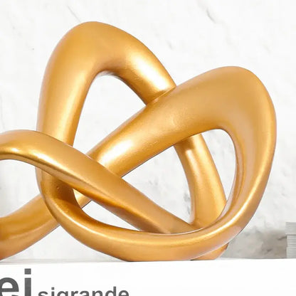 Modern golden twisted dough rope knot sculpture living room decor