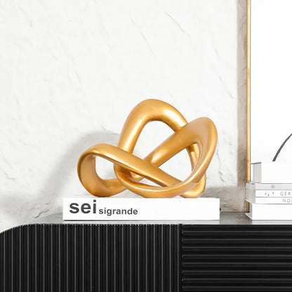 Modern golden twisted dough rope knot sculpture living room decor