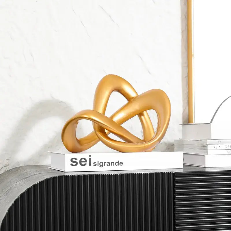 Modern golden twisted dough rope knot sculpture living room decor