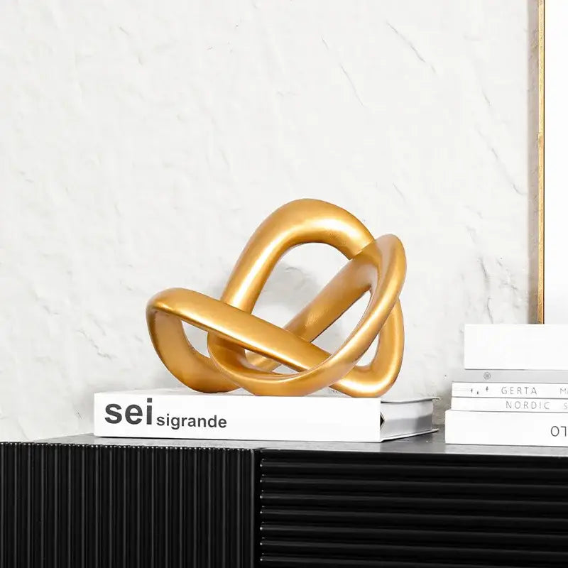 Modern golden twisted dough rope knot sculpture living room decor