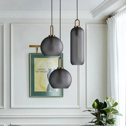 Modern gray and brass glass pendant light fixture kitchen lighting