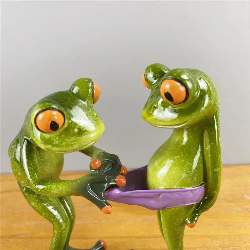 Modern green and orange leggy frog couple figurine living room decor