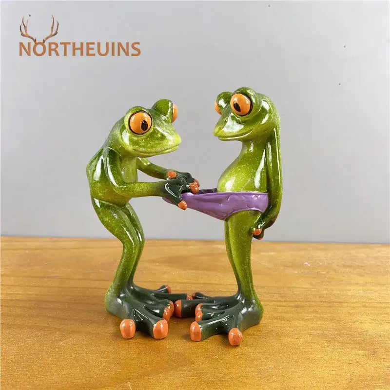 Modern green and orange leggy frog couple figurine living room decor