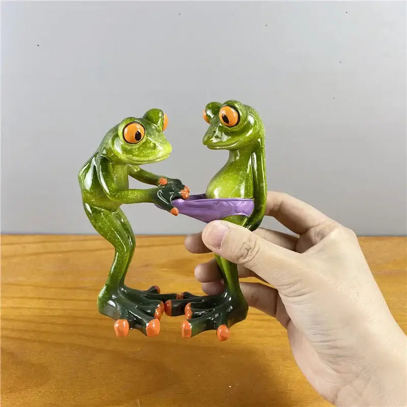 Modern green and orange leggy frog couple figurine living room decor
