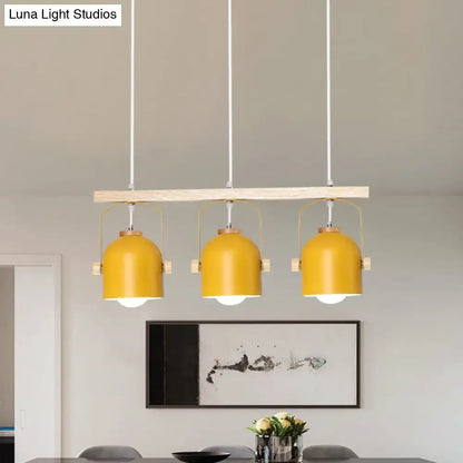Modern green dome island light with wood accents for kitchen dining