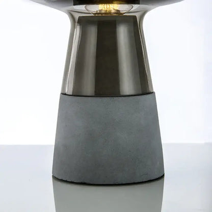 Modern industrial smoked glass and cement table lamp bedroom light