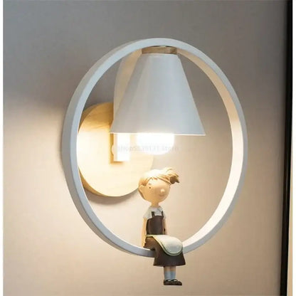 Modern iron led wall lamps with child figurine for bedroom