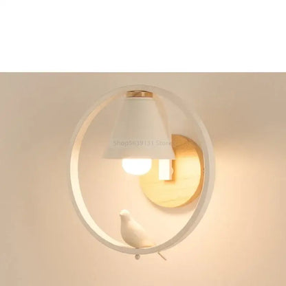 Modern iron led wall lamps with child figurine for bedroom
