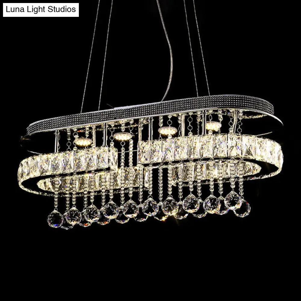 DecorBites™ Modern LED Crystal Pendant Light with Stainless Steel Frame and Tassel Accents