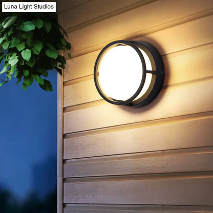 DecorBites™ Modern LED Outdoor Wall Sconce in Black Plastic - Stylish & Durable Lighting