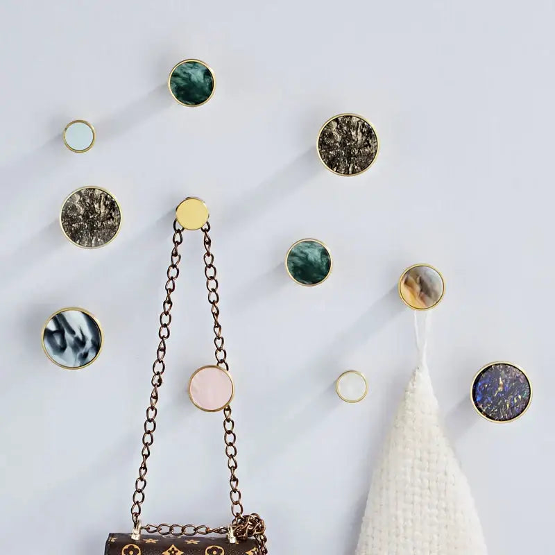 Modern marbled stone and brushed gold towel hook bathroom decor