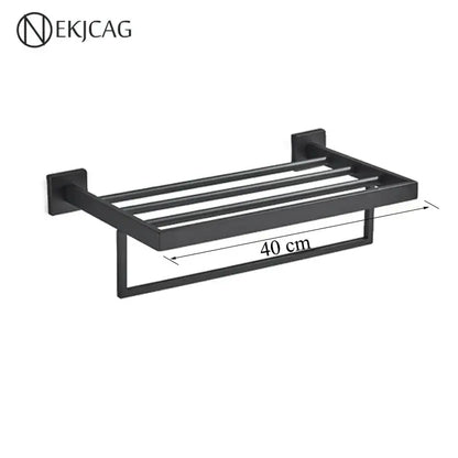 Modern matte black bathroom set with towel rack and gold rod accessories