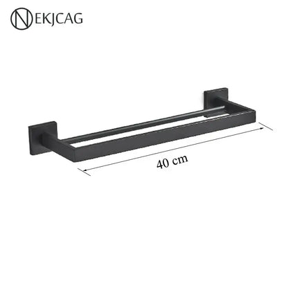 Modern matte black bathroom set with towel rack and gold rod accessories