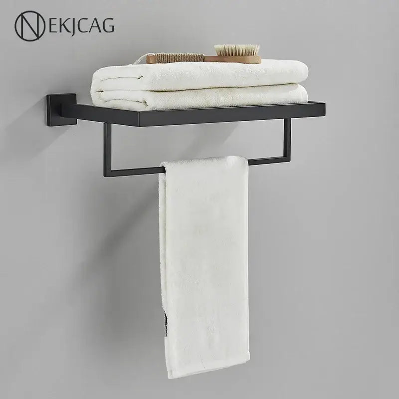 Modern matte black bathroom set with towel rack and gold rod accessories